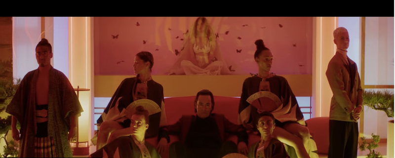 Is the woman in the background, with the veil and the flowers supposed to be Katy Perry or am I missing something?